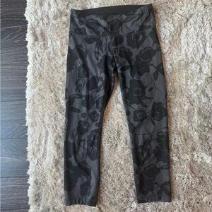 Lululemon Mid rise cropped black and gray floral leggings, size 2
